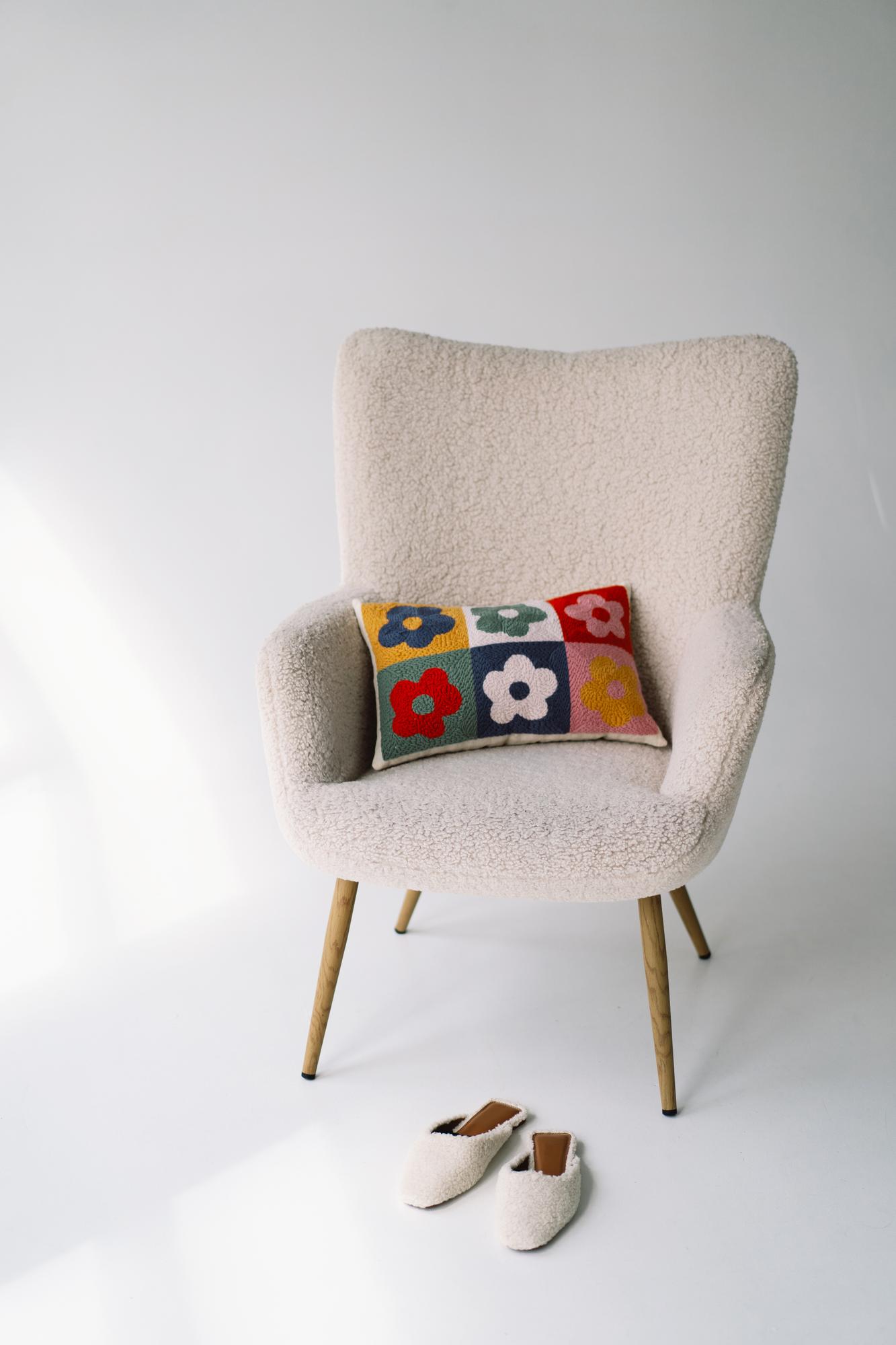 finished embroidered cushion on chair